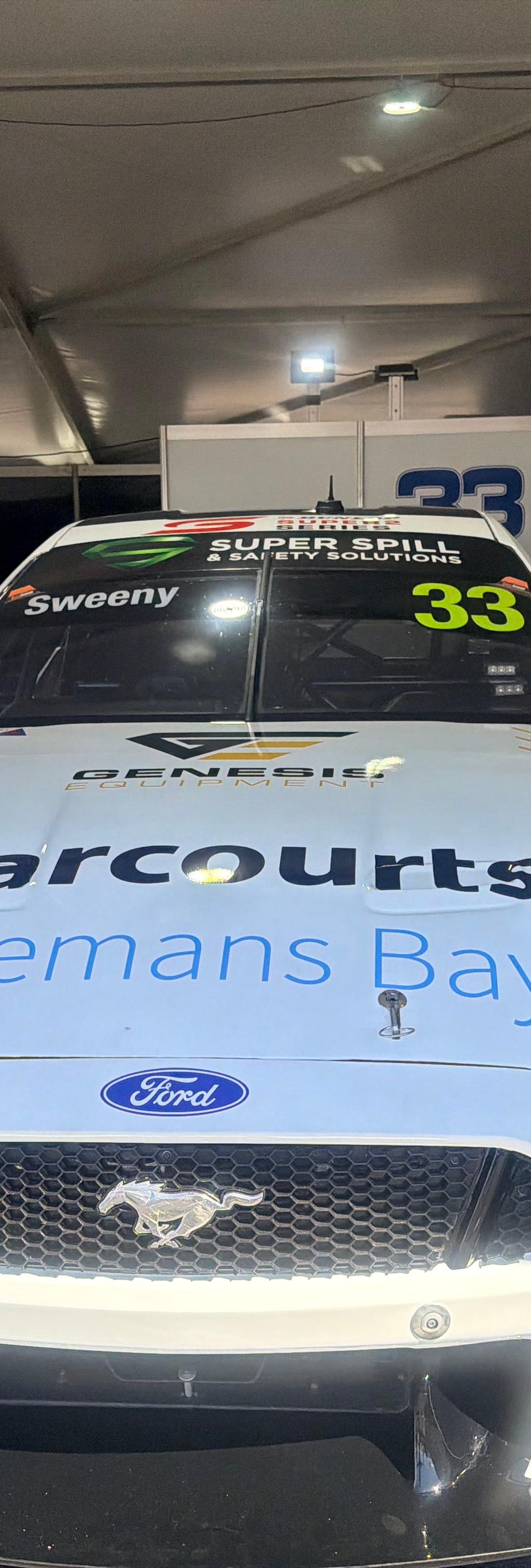 Dene Lewthwaite and Omania Terry with the Harcourts Batemans Bay branded #33 Ford Mustang