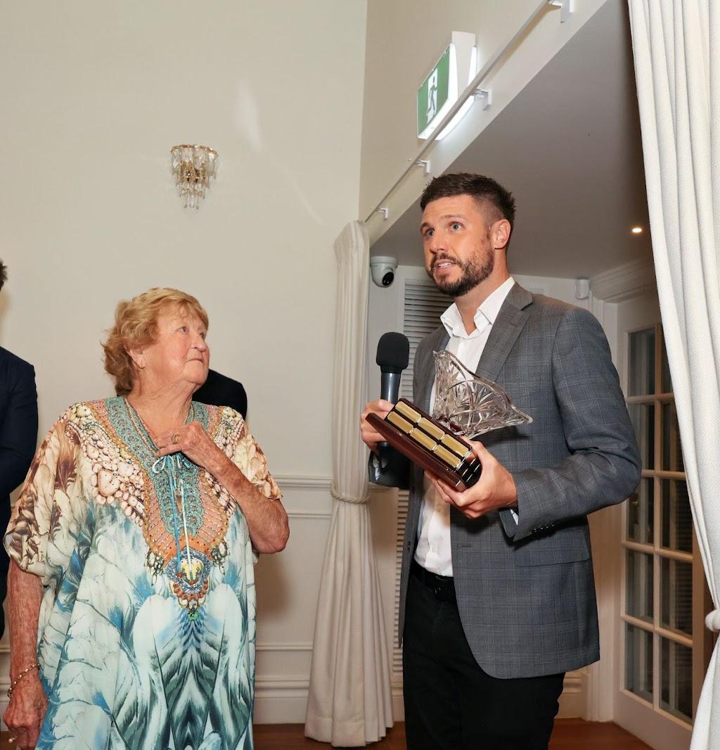 Shaun Doyle accepting the Myf Porter Award at the annual Crows Nest Conference in 2024.